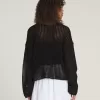 Maglione corto lavorato a maglia aperta Mila Maglione corto lavorato a maglia aperta Mila