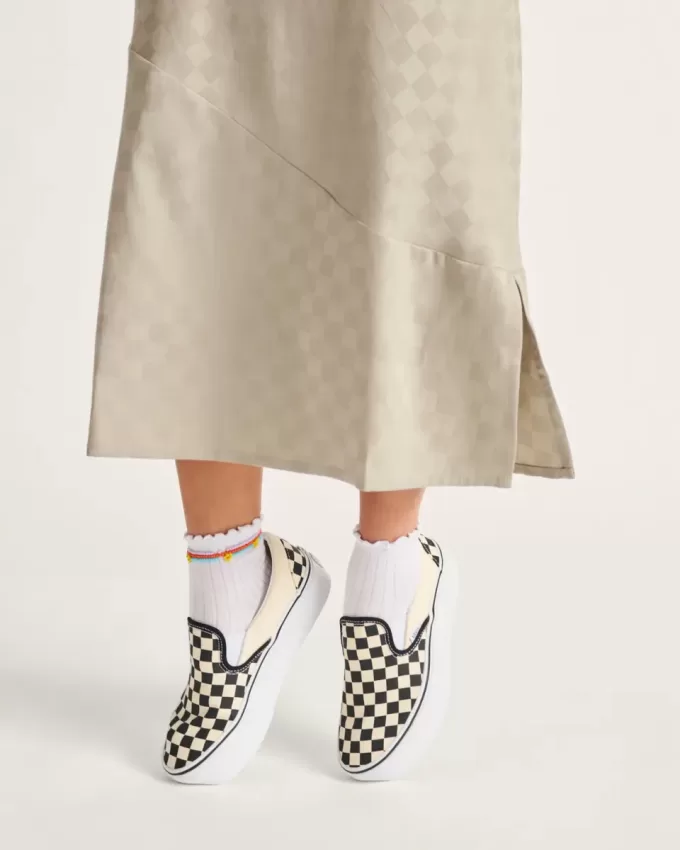 Scarpa classica slip-on con plateau a scacchi Scarpa classica slip-on con plateau a scacchi